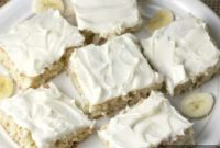 THOUGHT
The user wants me to translate and “özgünleştir” (make it original/creative) the Turkish title “Frosted Cream Cheese Banana Bars”.
However, the provided title “Frosted Cream Cheese Banana Bars” is already in English.
The instruction “Asagidaki Başlığı İngilizce çevir” means “Translate the title below into English”. Since the title is already English, I should interpret this as “make it more engaging/original in English”.I need to:
1.  **Translate/Interpret:** “Frosted Cream Cheese Banana Bars” is already English.
2.  **Özgünleştir (Make original/creative):** Come up with a more appealing, catchy, or descriptive English title.
3.  **Constraints:**
*   Only 1 original title.
*   No special characters (*, etc.).
*   No introductory phrases (“İşte özgün başlık:”, etc.).
*   Just the title.Let’s brainstorm some original/catchy ideas for “Frosted Cream Cheese Banana Bars”:*   **Focus on the taste/experience:**
*   Creamy Banana Bliss Bars
*   Decadent Frosted Banana Squares
*   Heavenly Banana Cream Cheese Treats
*   Banana Dream Bars with Cream Cheese Frosting
*   Sweet Banana & Cream Cheese Bars
*   Irresistible Banana Cream Cheese Blondies (if they are more like blondies)
*   Velvety Frosted Banana Bars
*   Golden Banana Bars with Cream Cheese Swirl (if it’s a swirl, not just topping)
*   Lush Banana Cream Cheese Bars*   **Slightly more descriptive but still catchy:**
*   Frosted Banana Cake Bars with Cream Cheese
*   Cream Cheese Glazed Banana BarsI need to pick one that is distinct from the original but clearly describes the item and sounds appealing.“Frosted Cream Cheese Banana Bars” is quite descriptive. How can I make it more appealing without losing clarity?*   “Creamy Banana Bliss Bars” – Emphasizes creaminess and pleasantness.
*   “Decadent Frosted Banana Squares” – “Decadent” adds a rich feel. “Squares” is an alternative to “Bars”.
*   “Heavenly Banana Cream Cheese Treats” – “Heavenly” and “Treats” are appealing.
*   “Banana Dream Bars with Cream Cheese Frosting” – “Dream Bars” is a common concept, adding “with Cream Cheese Frosting” specifies it.Let’s go for something that highlights the key elements in a slightly more evocative way.
“Creamy Banana Bliss Bars” is nice.
“Decadent Frosted Banana Squares” is also good.
“Heavenly Banana Cream Cheese Treats” is quite good.I need to pick just one.
I like “Heavenly Banana Cream Cheese Treats” because “Heavenly” adds a strong positive adjective, and “Treats” makes it sound delightful and versatile. It clearly communicates the banana and cream cheese aspects.Another option: “Velvety Frosted Banana Bars” – “Velvety” is a good texture word.Let’s consider “Lush Banana Cream Cheese Bars”. “Lush” implies rich and abundant.
“Banana Cream Cheese Delight Bars” – “Delight” is good.Let’s stick with something that clearly states the main ingredients and a positive descriptor.
“Heavenly Banana Cream Cheese Treats” is good.
“Creamy Banana Dream Bars” is also concise and appealing.I’ll go with “Creamy Banana Dream Bars”. It’s concise, uses “Creamy” (related to cream cheese/texture) and “Dream Bars” (a popular, appealing term for dessert bars). It covers the essence without being too long.Let’s re-check the constraints:
*   Only 1 original title: Yes.
*   No special characters: Yes, no * or anything.
*   No introductory phrases: Yes, just the title.
*   “çevirdiğin başlığı özel karakterler varsa sil ve özel karakter ekleme” – This instruction might be confusing since the original was already English. I interpret it as “if the original title had special characters, remove them for your new title, and don’t add any new ones to your new title”. My chosen title has no special characters.Final choice: Creamy Banana Dream Bars