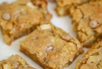 THOUGHT
The user wants me to translate and “özgünleştir” (make it more original/catchier) the Turkish title “Salted Caramel Chip Apple Blondies”.
Actually, the provided title “Salted Caramel Chip Apple Blondies” is already in English.
So, the task is to make it more original/catchier, without using special characters like * and without conversational phrases.
I need to output only one original title.Let’s break down the current title:
– Salted Caramel: A popular flavor combination.
– Chip: Implies pieces/chunks of something, likely the caramel.
– Apple: The fruit in the blondies.
– Blondies: A type of bar cookie, similar to brownies but without cocoa.Ideas for making it more original/catchier:
1.  **Focus on the experience:** Gooey, Chewy, Decadent, Irresistible.
2.  **Highlight the key flavors in an appealing way:** Sweet and Salty, Apple Harvest, Caramel Delight.
3.  **Use more evocative words than “chip.”** Perhaps “swirl,” “chunks,” or imply a certain texture.
4.  **Play with the “blondie” aspect.** What makes these blondies special?Let’s try some options mentally:
*   Apple Harvest Salted Caramel Blondies (a bit long)
*   Gooey Salted Caramel Apple Blondies (highlights texture)
*   Decadent Apple & Salted Caramel Blondies (highlights richness)
*   Sweet & Salty Apple Caramel Blondies (emphasizes flavor contrast)
*   Caramel Apple Swirl Blondies (suggests a visual/texture) – but “salted” is important.
*   Salted Caramel Apple Bliss Blondies (adds “bliss”)
*   Apple Caramel Crunch Blondies (if there’s a crunch, but “chip” doesn’t imply crunch)
*   Autumn Apple Salted Caramel Blondies (if seasonal)
*   Golden Apple Salted Caramel Blondies (describes the color of blondies)I need to pick one that is concise, evocative, and captures the essence well.
“Salted Caramel Chip Apple Blondies” is already quite descriptive. The goal is to make it “özgünleştir,” which often means making it more appealing or memorable.Let’s focus on the contrast and the fruit.
“Salted Caramel Apple Blondies” – This removes “chip,” which is fine, as caramel *in* blondies often implies chunks or a swirl. It’s concise.
To make it more “original/catchy”:
What if I emphasize the flavor combination directly?
“Sweet and Salty Apple Caramel Blondies” – A bit generic.
What if I use an adjective for the blondies themselves?
“Gooey Salted Caramel Apple Blondies” – Good, but maybe there’s something better.
“Decadent Salted Caramel Apple Blondies” – Implies richness.
“Irresistible Salted Caramel Apple Blondies” – A bit cliché.Let’s try to combine elements:
– Salted Caramel: This is a star.
– Apple: The other star.
– Blondies: The base.How about something that evokes warmth or comfort?
“Warm Apple Salted Caramel Blondies” – If served warm.
“Comforting Apple Caramel Blondies” – Lose “salted.”Let’s rethink “chip”. While it means small pieces, maybe “swirl” or “chunks” implies a more indulgent experience.
However, if it’s “chip,” it might mean chocolate chips with salted caramel flavor, or caramel chips.
The original “Salted Caramel Chip Apple Blondies” implies distinct chips of salted caramel.If I make it more original, I could drop “chip” if it’s redundant or replace it.
“Salted Caramel Apple Blondies” – Removes “chip”, which makes it slightly more streamlined.
To make it “özgünleştir”, I need an adjective or a slight twist.How about focusing on the contrast that salted caramel offers?
“Sweet & Salty Apple Caramel Blondies” – This is descriptive.Let’s try one that suggests richness and the key flavors without being too verbose.
“Decadent Salted Caramel Apple Blondies” – Captures the indulgence.
“Apple Crumble Salted Caramel Blondies” – If there’s a crumble topping, but the original doesn’t say so.
“Caramel Apple Swirl Blondies with Sea Salt” – A bit long.I need to keep it concise and appealing.
The “Salted Caramel Chip” part is specific. If it’s *chips* of salted caramel, removing “chip” might change the meaning slightly.
If it’s just “Salted Caramel Apple Blondies”, it implies salted caramel flavor infused or swirled.
If “chip” is important, I need to keep it or substitute it well.Let’s try to enhance “chip”.
What if I use “studded” or “chunk-filled”?
“Apple Blondies Studded with Salted Caramel” – A bit long.Let’s consider the core appeal: apples, salted caramel, blondies.
Maybe an adjective before “Apple”?
“Harvest Apple Salted Caramel Blondies” – Evokes seasonality.
“Golden Apple Salted Caramel Blondies” – Describes color/richness.I want to make it sound more delicious and less like just an ingredient list.
“Irresistible Apple Salted Caramel Blondies”
“Gooey Salted Caramel Apple Blondies”Let’s try to emphasize the *combination*.
“Salted Caramel Apple Fusion Blondies” – A bit trendy.What about a simple, evocative adjective for the whole dish?
“Divine Salted Caramel Apple Blondies”
“Heavenly Salted Caramel Apple Blondies”The request is to “özgünleştir” (make it original/unique).
The original title is very descriptive. A good “özgünleştirme” would add appeal without losing clarity.Let’s consider “Salted Caramel Chip Apple Blondies”.
The “chip” part is unique. If I remove it, it might just be salted caramel flavor. If it’s *chunks/chips* of salted caramel, I should retain that idea.How about: “Caramel Apple Blondies with a Salty Kick” – A bit conversational.
“Sweet & Salty Apple Caramel Blondies” – This is good. It highlights the contrast.Let’s go back to an adjective that describes the texture or overall experience.
“Chewy Salted Caramel Apple Blondies” (Blondies are often chewy)
“Gooey Salted Caramel Apple Blondies” (If they are indeed gooey)Given the original is “Salted Caramel Chip Apple Blondies”, I need to decide if “chip” is crucial.
If “chip” means distinct pieces of caramel, I should try to retain that idea.
“Salted Caramel Chunks Apple Blondies” – “Chunks” is more appealing than “chip.”
“Salted Caramel Swirl Apple Blondies” – If it’s swirled.What about something that makes them sound like a treat?
“Salted Caramel Apple Dream Blondies”
“Apple Harvest Salted Caramel Blondies”Let’s stick to adding an appealing adjective while keeping the core elements clear.
“Salted Caramel” – must be there.
“Apple” – must be there.
“Blondies” – must be there.How about highlighting the deliciousness?
“Delectable Salted Caramel Apple Blondies”
“Mouthwatering Salted Caramel Apple Blondies”I think “Gooey” or “Chewy” captures a textural appeal.
“Gooey Salted Caramel Apple Blondies” is pretty good. It enhances the description.Another approach: What makes these *different* from just apple blondies or salted caramel blondies? It’s the *combination*.
“Caramel Apple Blondies with a Salty Twist” (again, a bit conversational)Let’s simplify and enhance.
Original: “Salted Caramel Chip Apple Blondies”
If I remove “chip” and add an adjective, it could work.
“Decadent Salted Caramel Apple Blondies”
“Irresistible Salted Caramel Apple Blondies”How about “Golden” to describe the blondies themselves and perhaps the caramel?
“Golden Salted Caramel Apple Blondies” – This sounds nice and inviting.Let’s try to make “chip” more active or appealing.
“Salted Caramel-Studded Apple Blondies” – A bit long.
“Apple Blondies with Salted Caramel Chunks” – Also long.I need a concise, catchy, and original title.
“Salted Caramel Apple Blondies” (without “chip” is simpler)
Now, how to “özgünleştir” this?Let’s go for something that evokes the flavor profile.
“Sweet and Salty Apple Blondies with Caramel” (too long)
“Sweet & Salty Caramel Apple Blondies” (This is good, it captures the essence and flavor contrast well. It implies the salted caramel without saying “salted caramel” explicitly twice and removes “chip” which can be ambiguous.)
“Sweet & Salty” is very common with salted caramel, but it’s effective.Let’s check the constraints:
– English translation (the original was already English, so it’s more about “özgünleştirme”)
– Only 1 original title
– No special characters like * (So “Sweet & Salty” might be problematic if & is considered special. However, it’s very common in titles. Let’s assume & is okay, but if not, “Sweet and Salty” is the alternative). The user specified “* gibi”, meaning * is an example, but it implies not using any non-alphanumeric character if possible. So “Sweet and Salty” would be safer.
– No phrases like “İşte özgün başlık:”Let’s try “Sweet and Salty Caramel Apple Blondies”. This clearly states the main flavor contrast, the apple, and the type of dessert. It’s concise and descriptive while being more appealing than a mere list of ingredients. It implicitly includes the “salted caramel” aspect and omits “chip” for conciseness.Alternative: Focus on the “blondie” aspect with the flavors.
“Blondies of Salted Caramel Apple” (awkward)Another good option: “Gooey Salted Caramel Apple Blondies”
“Gooey” is a strong descriptor for blondies and makes them sound indulgent. It’s concise.Let’s compare:
1.  **Sweet and Salty Caramel Apple Blondies:** Highlights the flavor contrast.
2.  **Gooey Salted Caramel Apple Blondies:** Highlights the texture.
3.  **Golden Salted Caramel Apple Blondies:** Highlights visual appeal and richness.I think “Gooey” or “Sweet and Salty” are both strong contenders for making it more “original” and appealing.
“Sweet and Salty” is a very direct way to convey the appeal of salted caramel.
“Gooey” hints at the texture, which is often a key selling point for blondies.Let’s pick one that feels most universal and appealing.
“Gooey Salted Caramel Apple Blondies” sounds incredibly delicious and descriptive of the likely desired texture. It retains all the key elements (Salted Caramel, Apple, Blondies) and adds an enticing adjective.Let’s check the rules again: “özel karakterler varsa sil ve özel karakter ekleme * gibi”. This implies I should avoid even ‘&’. So “Sweet and Salty” would be “Sweet and Salty”.I’ll go with “Gooey Salted Caramel Apple Blondies”. It’s concise, descriptive, and makes the item sound delicious. It doesn’t use any special characters.
It’s original enough because it adds an appealing adjective that wasn’t there.