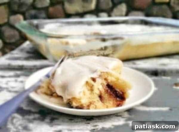 Ultimate Cinnabon Cinnamon Roll Cake 1 featured 4260