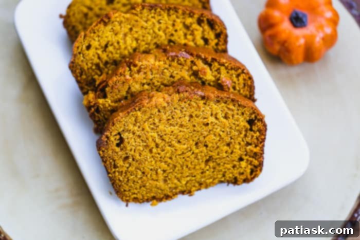 Starbucks Pumpkin Pound Cake Copycat Recipe 8 Close-up of the moist interior of a slice of pumpkin bread
