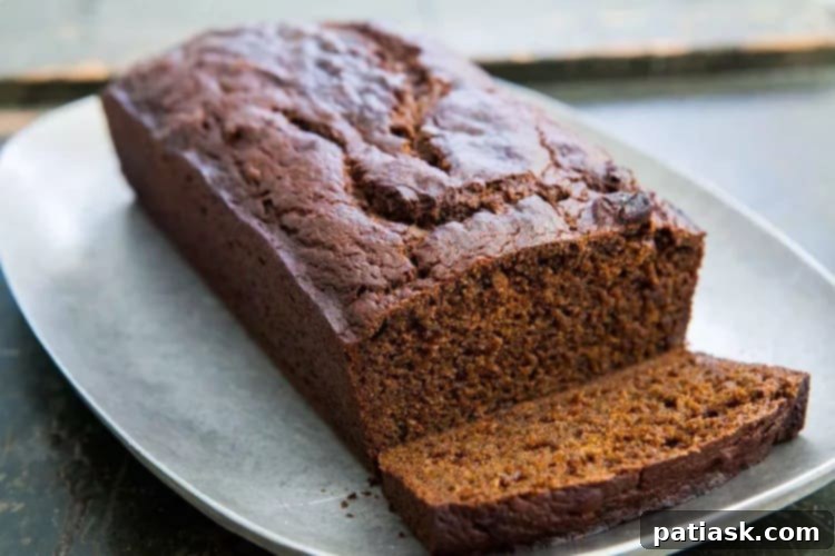 20 Pumpkin Bread Masterpieces for Autumn 15 Richly spiced pumpkin gingerbread, perfect for holiday baking with its warm autumn flavors.