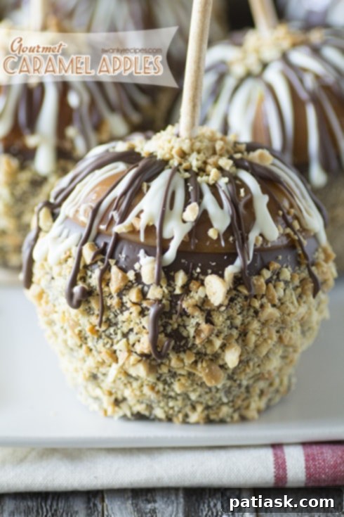 Homemade Gourmet Caramel Apples with Various Toppings