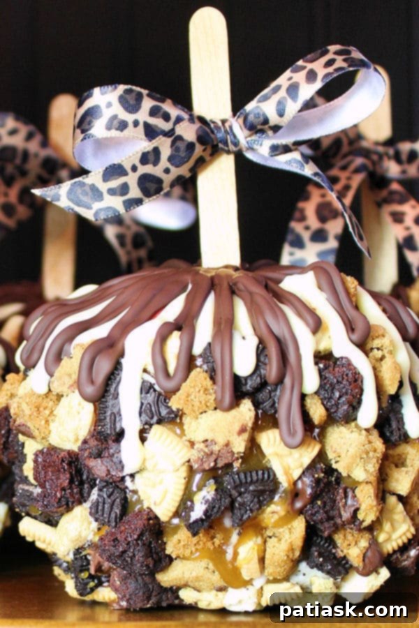 Decadent Slutty Caramel Apples with Cookies and Chocolate