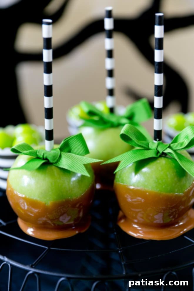 Green and Black Caramel Apples for Halloween Party