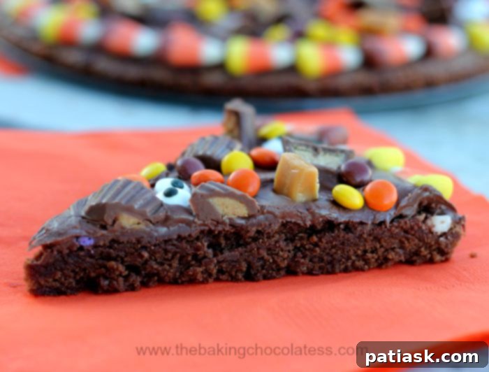 Frightfully Delicious Halloween Brownie Pizza 3 Wicked Good Halloween Brownie Pizza with decorative candies and chocolate spread