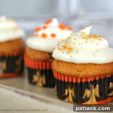 Plush Pumpkin Cupcakes with Vanilla Cream Cheese Frosting