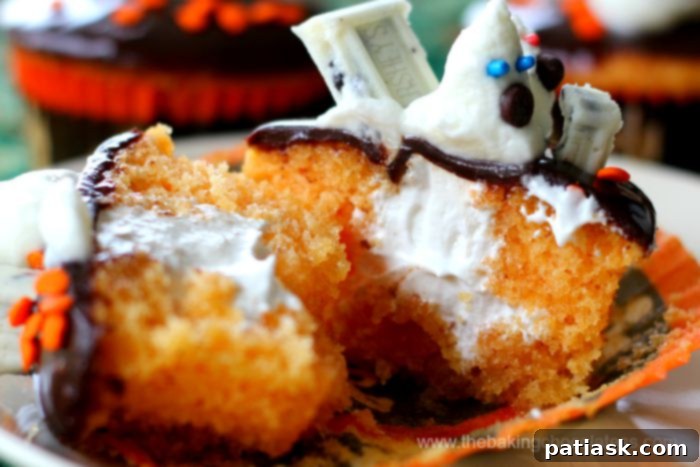 Ghostly Giggles Cupcakes 3 Close-up of a Cream-Filled 'Ghosts In the Graveyard' Cupcake with a ghost peeking from behind a gravestone.