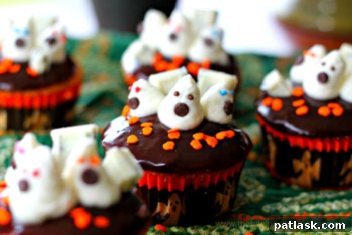 Ghostly Giggles Cupcakes 4 A tray of 'Ghosts In the Graveyard' Halloween Cupcakes ready for a party.