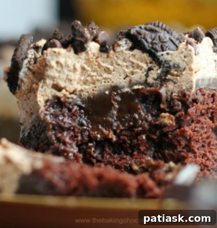 Oreo Fudge Burst Chocolate Poke Cake 3 Rich and Decadent Hot Fudge Oreo Chocolate Poke Cake