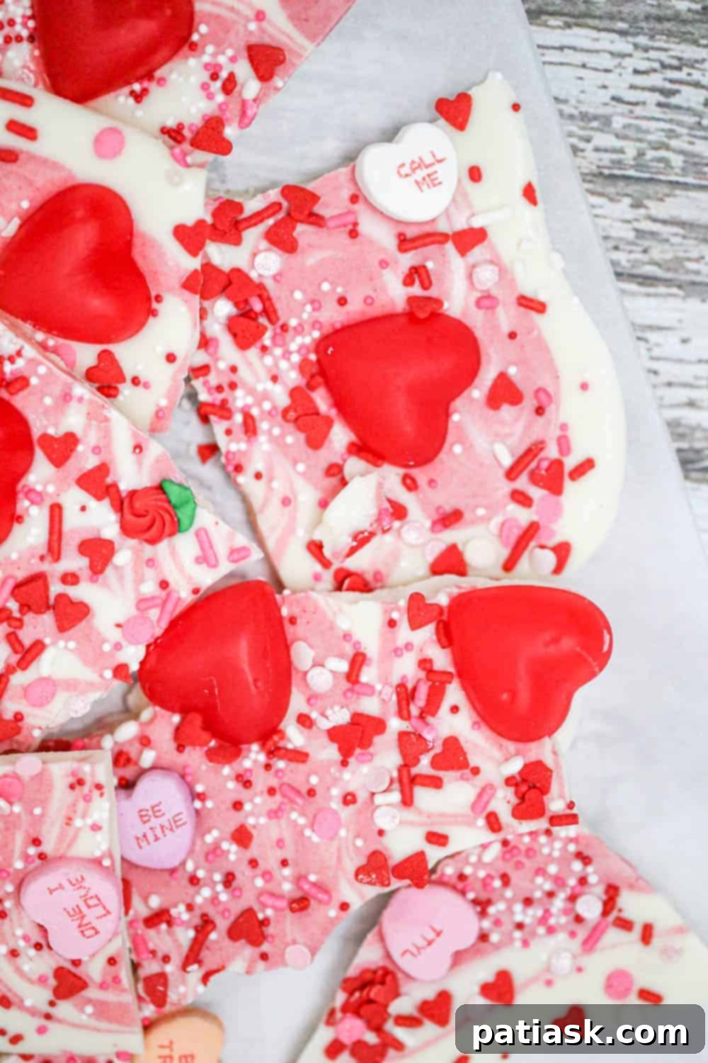 Valentine's Day Chocolate Bark 4 Valentine's Day Chocolate Bark featuring white chocolate and various red and pink candies