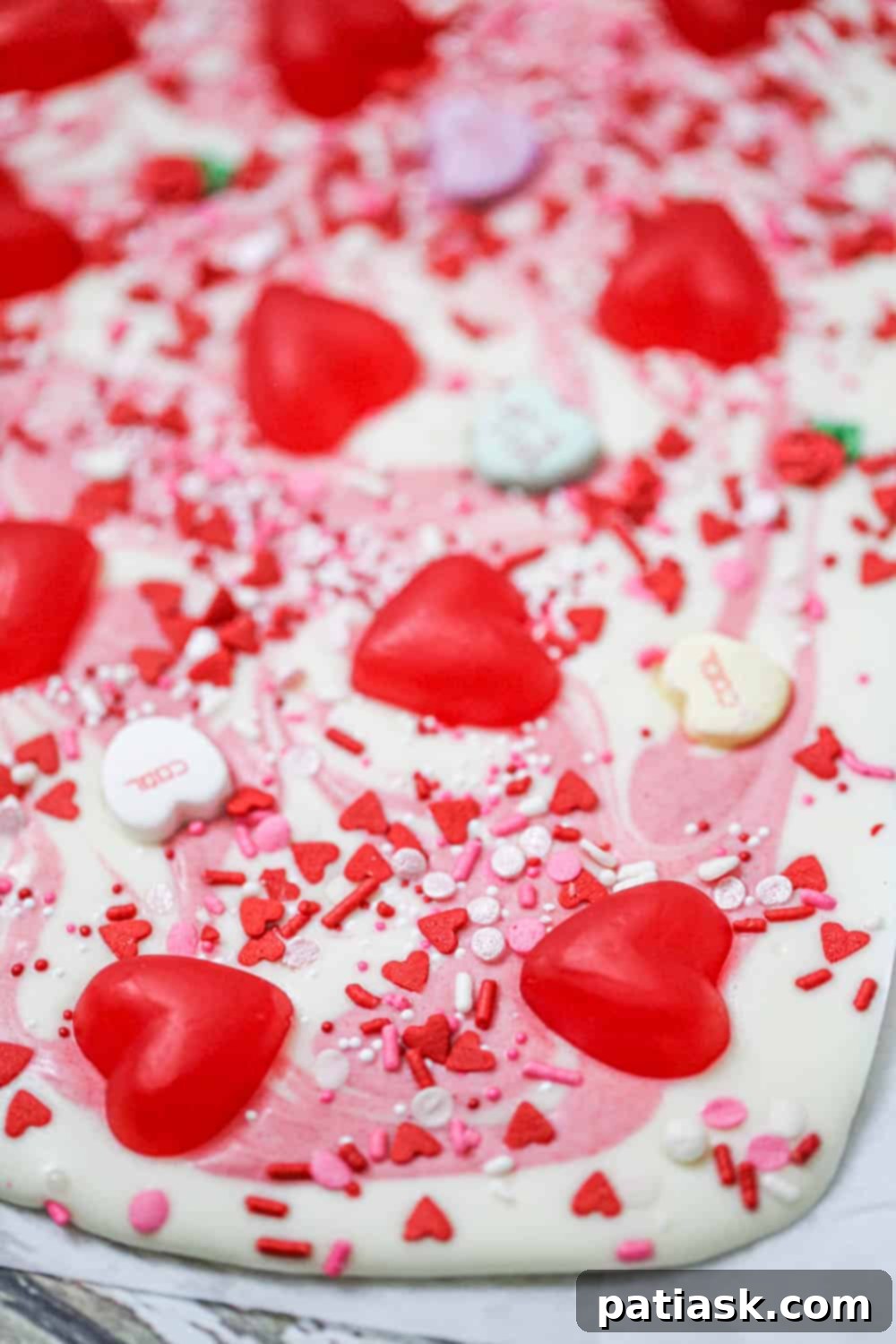 Valentine's Day Chocolate Bark 5 Close-up of Easy Valentine Chocolate Bark, highlighting the textures and colors of the toppings
