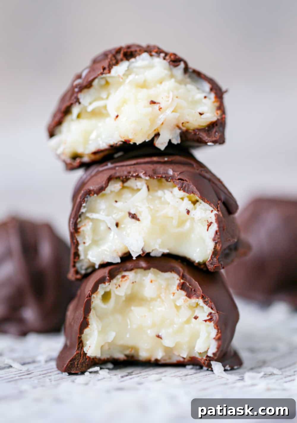 A stack of delicious Chocolate Covered Coconut Truffles