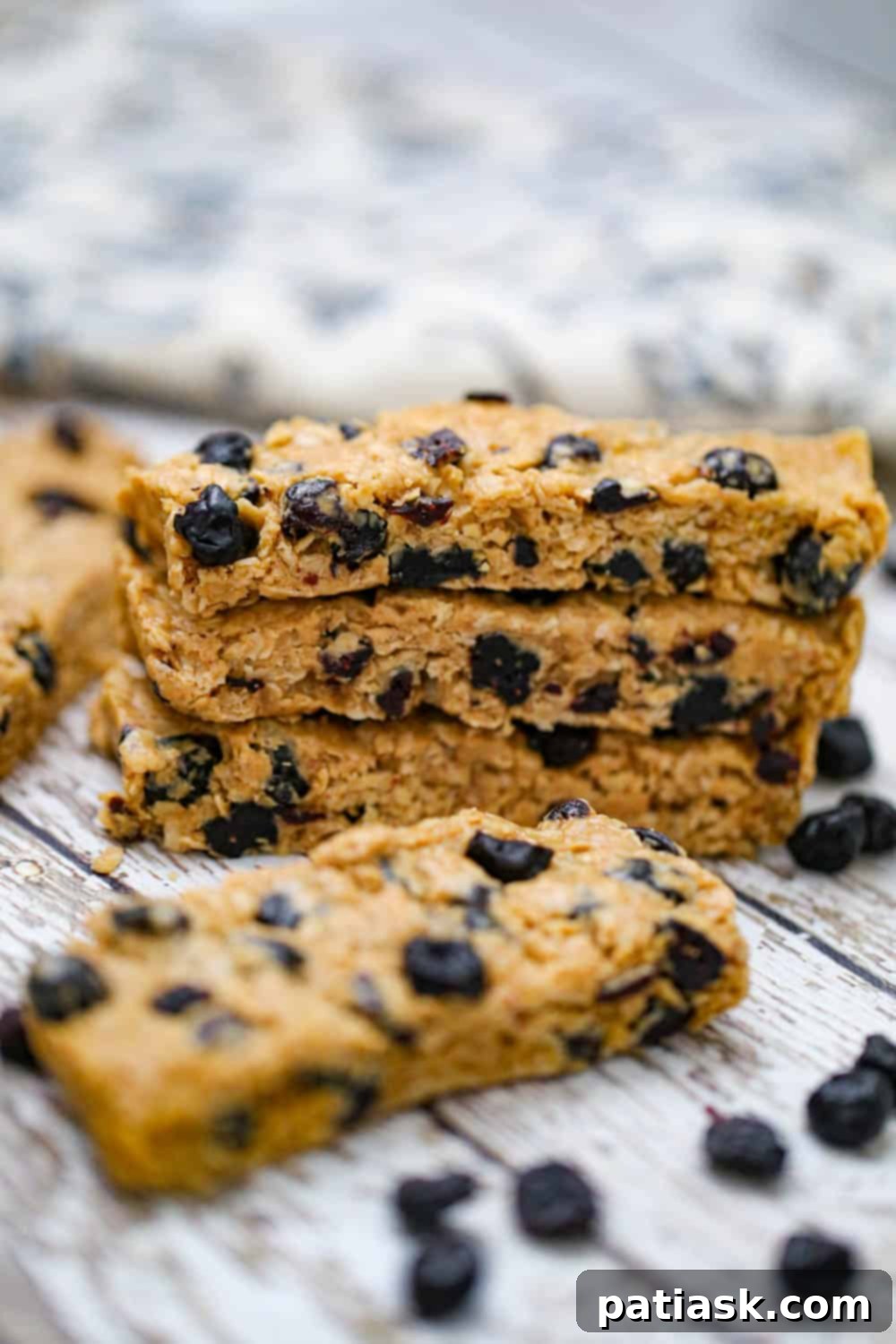 Stack of easy fruit granola bars on a serving dish
