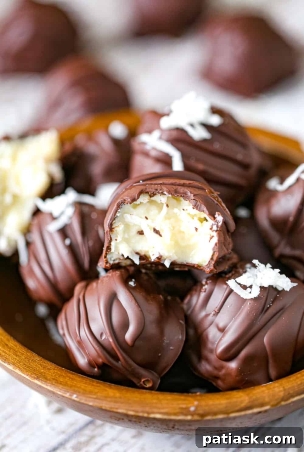 Melt Hearts: 20 Homemade Valentine Chocolate Recipes 3 Irresistible Chocolate Covered Coconut Truffles, a delicious homemade chocolate candy.