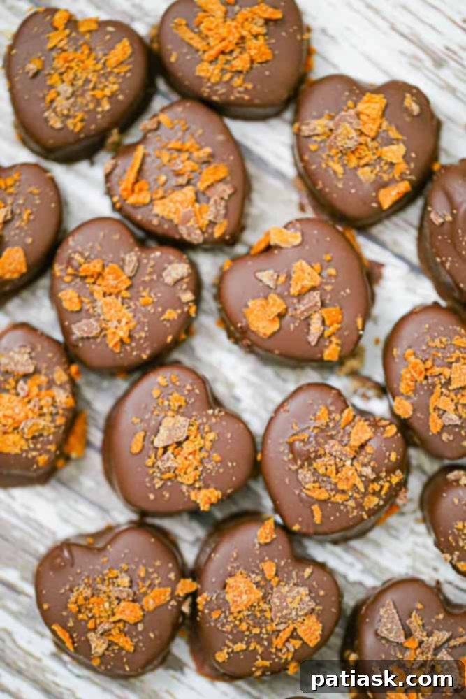 Melt Hearts: 20 Homemade Valentine Chocolate Recipes 6 Heart-shaped Butterfinger Truffles, a delicious homemade chocolate candy for Valentine's Day.