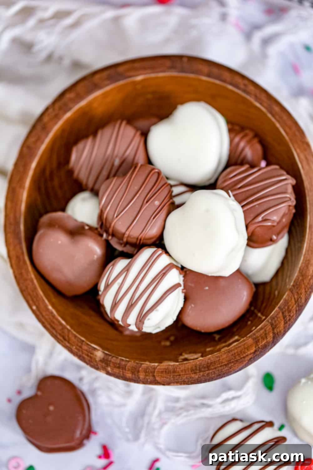 Melt Hearts: 20 Homemade Valentine Chocolate Recipes 8 Homemade Chocolate Covered Peanut Butter Valentine Hearts, a copycat Reese's recipe.