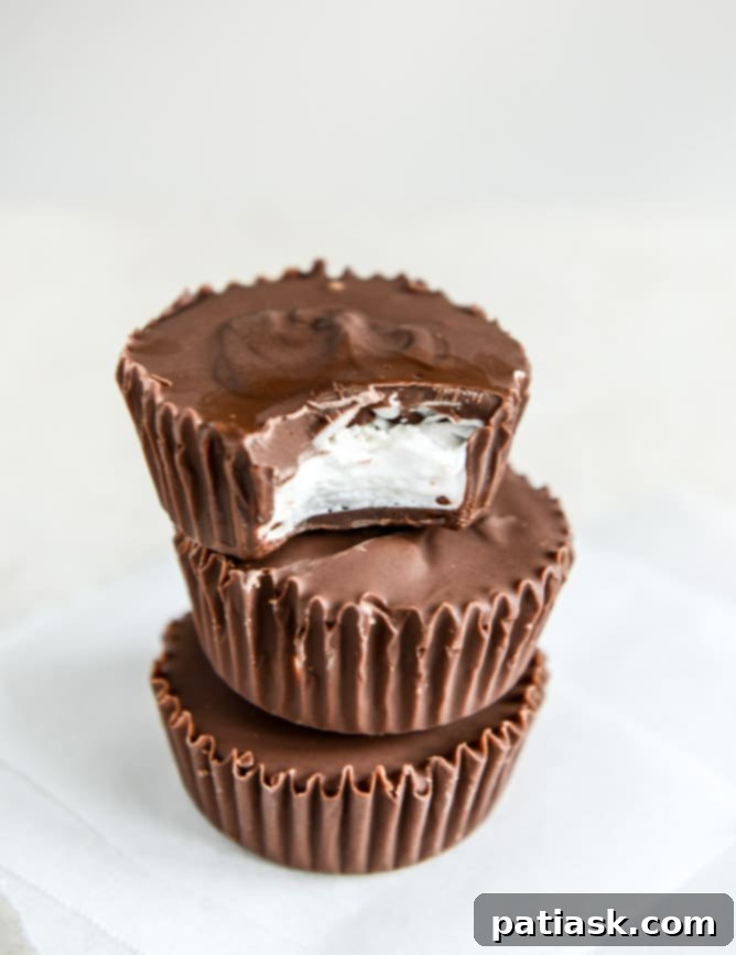 Homemade-Mallo-Cups-I-howsweeteats.com-2 Easy Homemade Mallo Cups by How Sweet Eats, a simple yet delicious chocolate and marshmallow Valentine's treat.