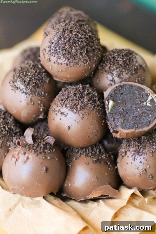 Oreo-Truffles Scrumptious Mint Oreo Truffles by Swanky Recipes, a fun and easy chocolate candy recipe for Valentine's Day.