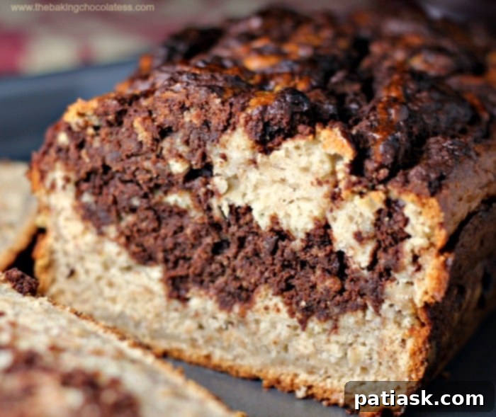Marbled Chocolate Peanut Butter Banana Bread 5 Close-up of baked Chocolate Swirled Peanut Butter Banana Bread slice