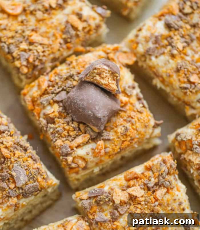 36 Must-Try Snack Cakes for Every Craving 38 Butterfinger Peanut Butter Snack Cake with Butterfinger candy pieces