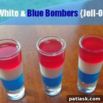 Stars and Stripes Shooters 4 A batch of Red, White, and Blue Jello Shots in individual cups, ready for a party.