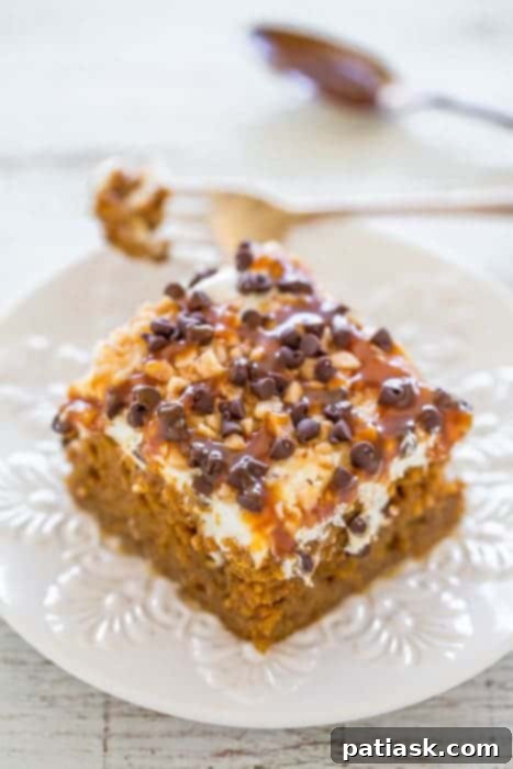 Pumpkin Poke Perfection: 10 Must-Try Cakes 9 Heavenly Caramel Drizzled Pumpkin Poke Cake with Toffee and Chocolate