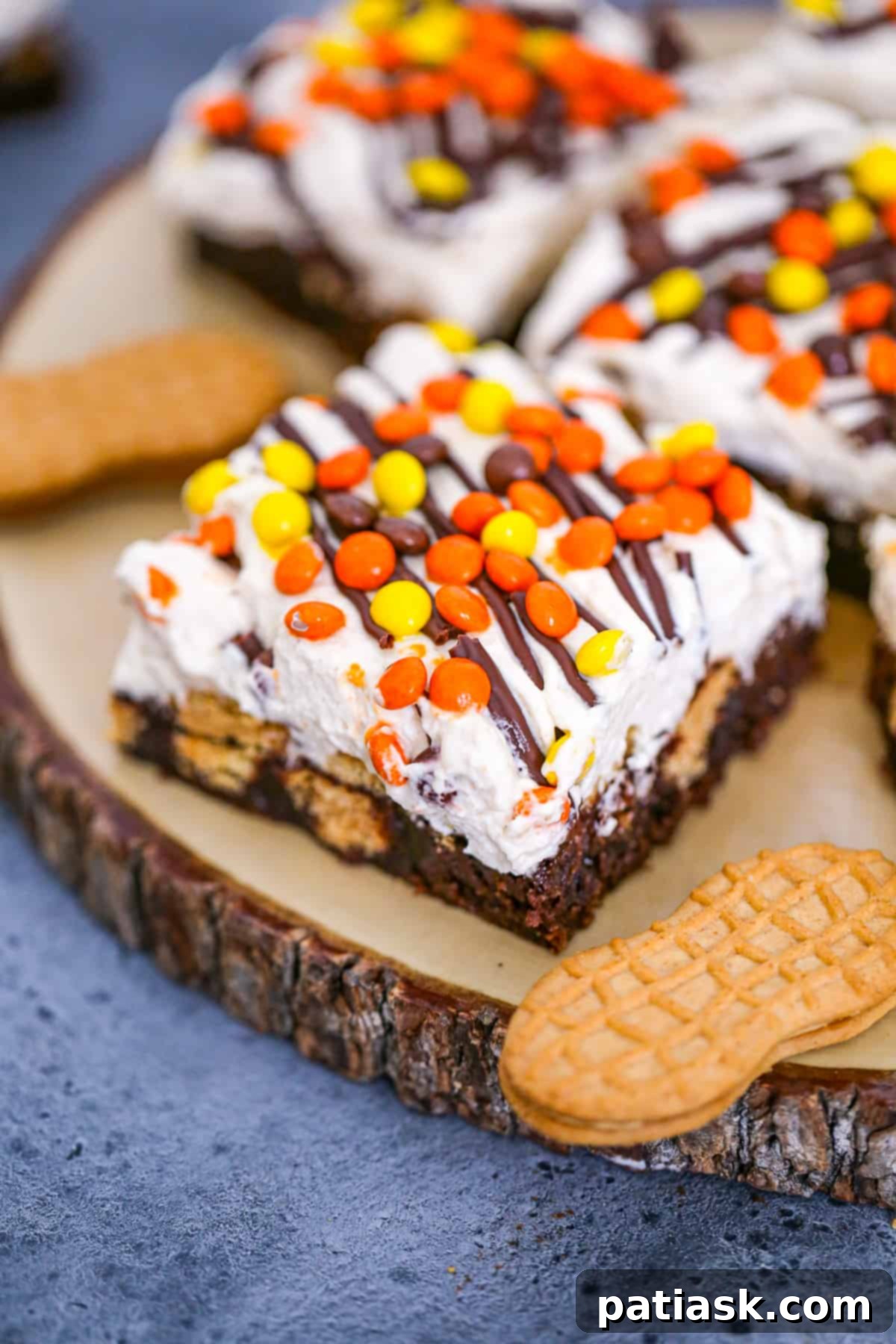 20 Hauntingly Delicious Halloween Treats 10 Nutter Butter Peanut Butter Brownie Delight bars.