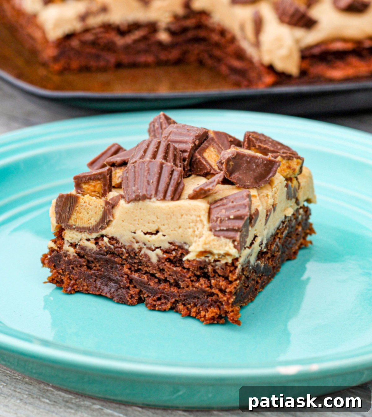 20 Hauntingly Delicious Halloween Treats 15 Reese’s Peanut Butter Cup Explosion Brownies with melted peanut butter.