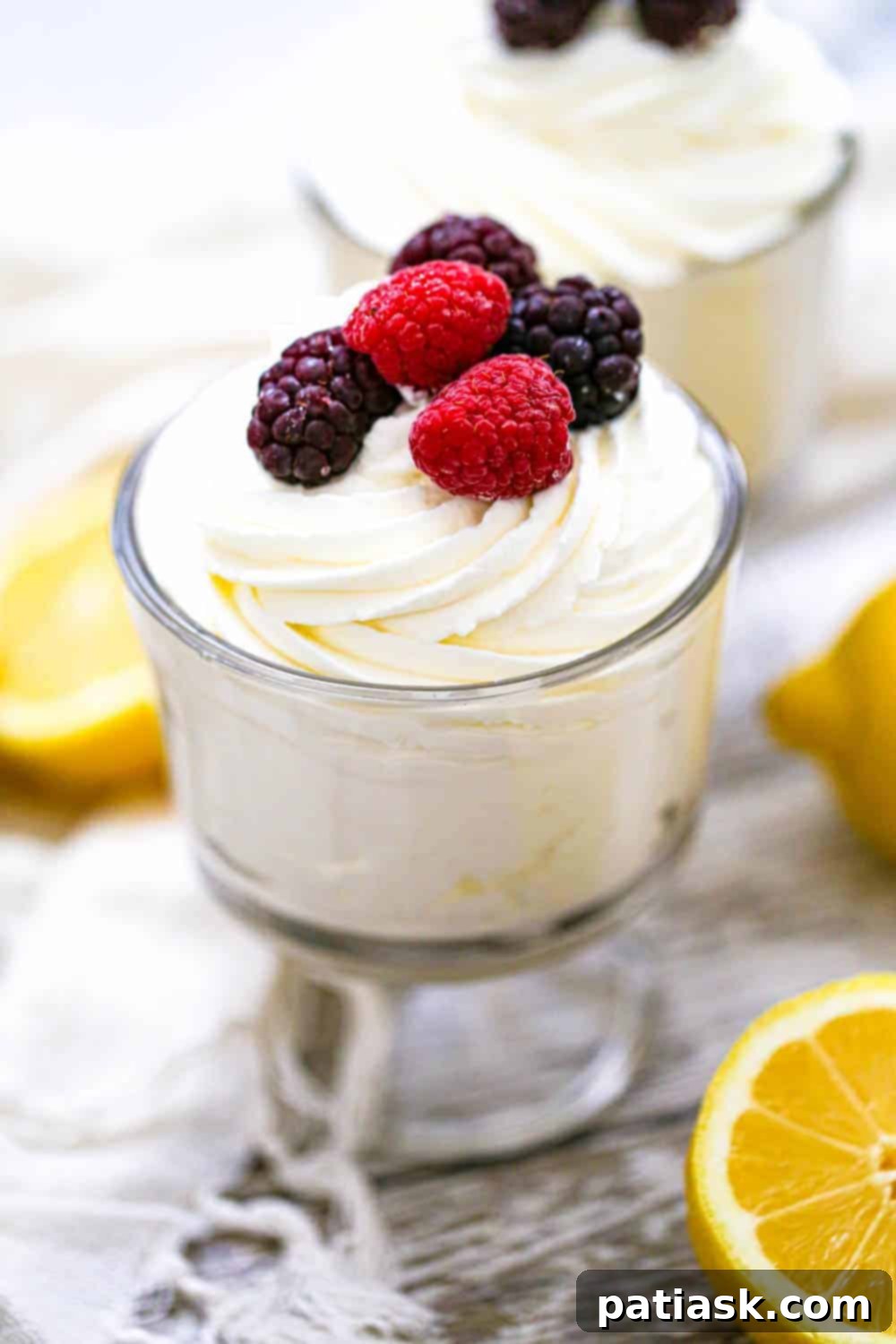 Cloud-Like Keto Lemon Mousse 6 Two servings of Keto Fluffy Lemon Burst Mousse with fresh raspberries