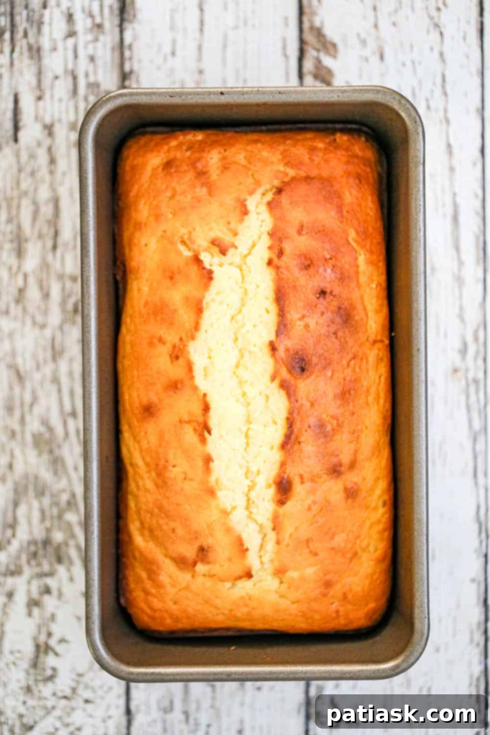 Starbucks-Inspired Glazed Lemon Loaf 6 Starbucks CopyCat Lemon Loaf - A close-up showing the perfect texture of the lemon loaf and its thick, sweet glaze.
