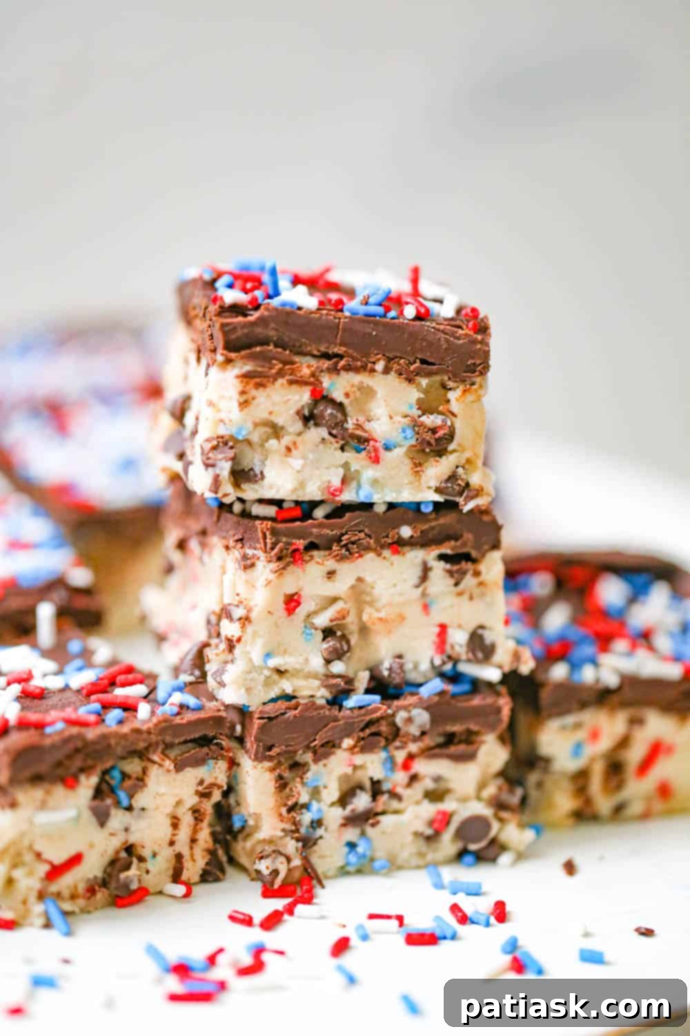 Chilled Chocolate Chip Cookie Dough Bars 7 Stack of no bake chocolate chip cookie dough treats with sprinkles