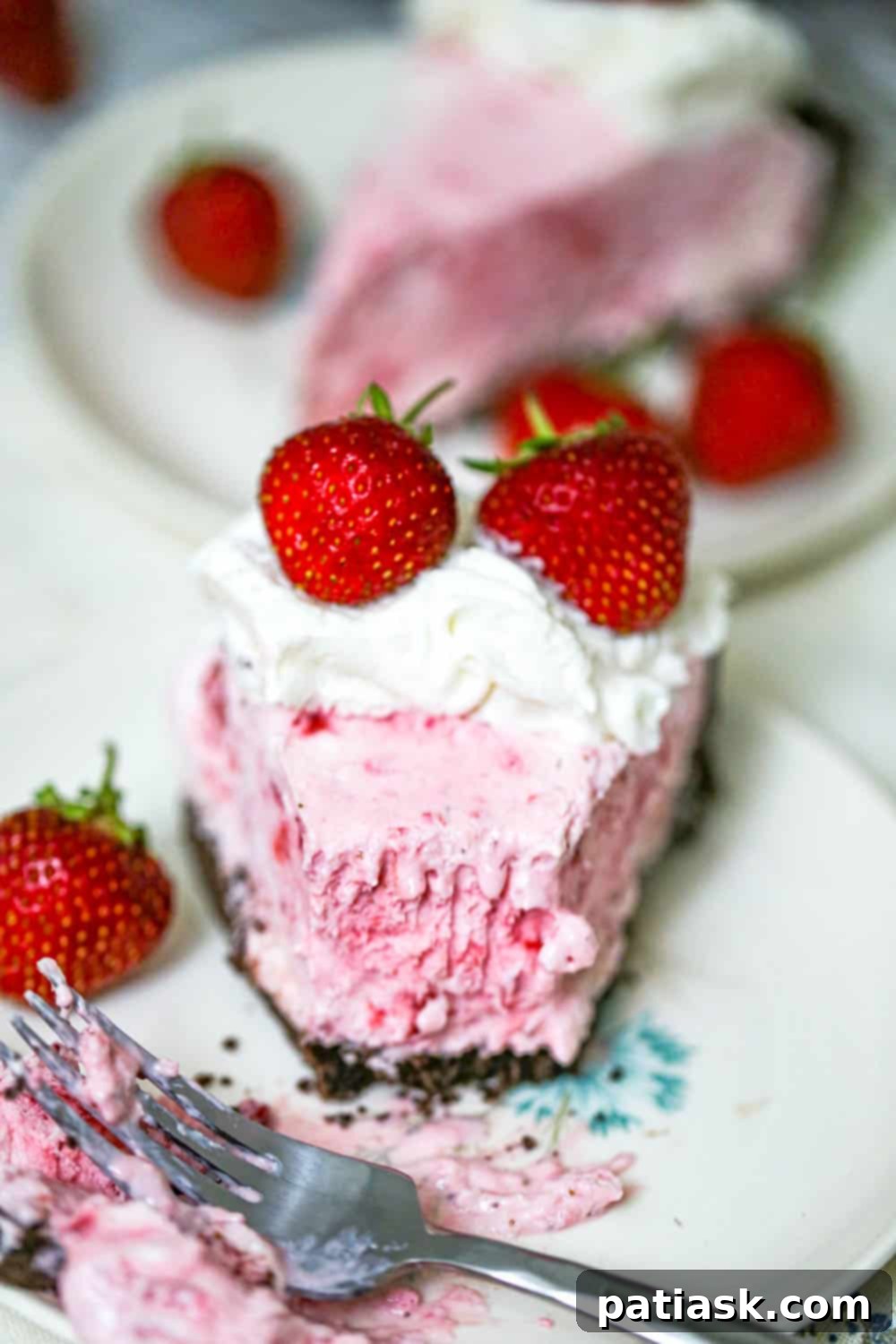 Strawberry Dream Cheesecake 5 Beautifully garnished frozen strawberries cheesecake