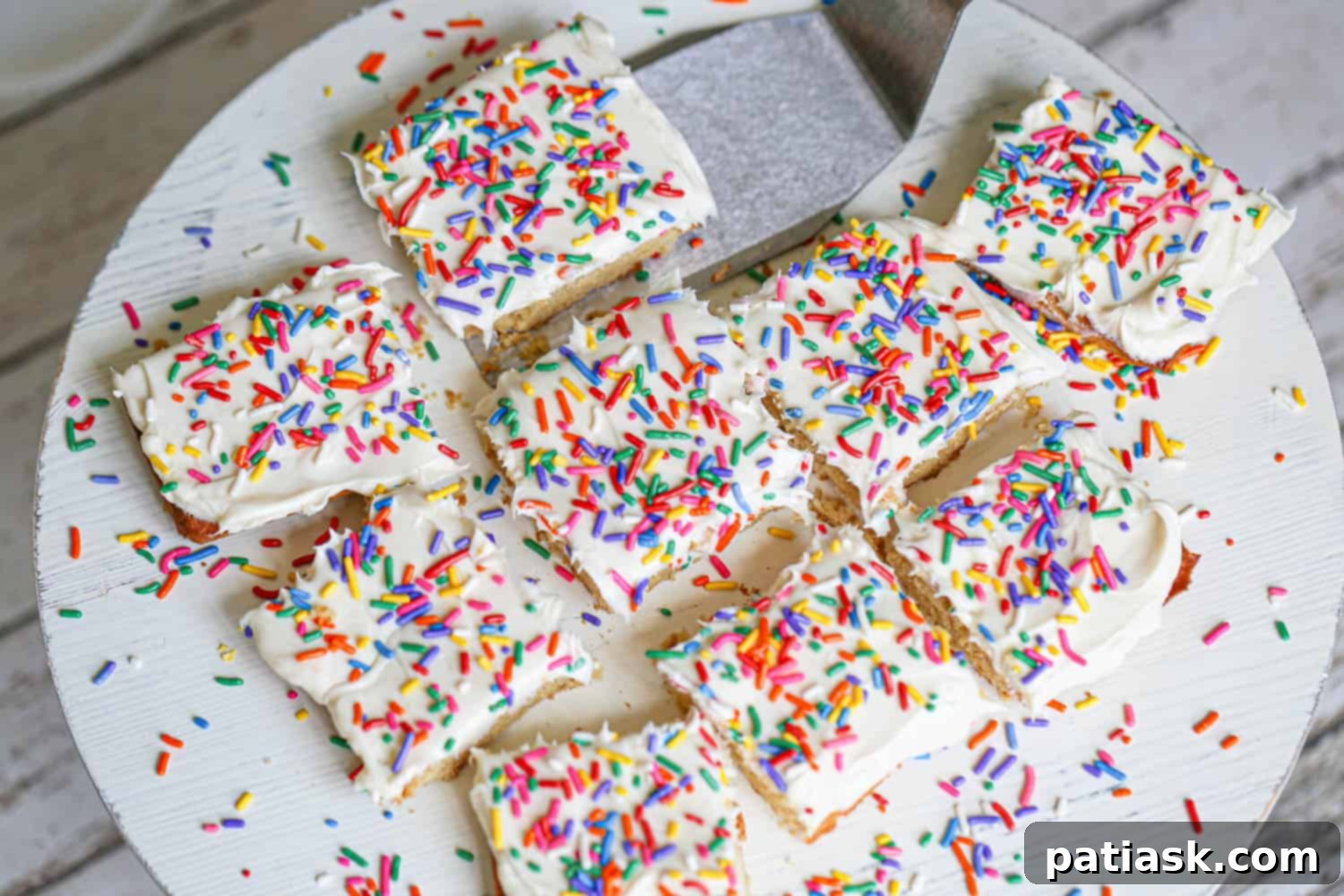 Effortless Gluten-Free Sugar Cookie Bars 4 Frosted sugar cookie bars ready to be cut
