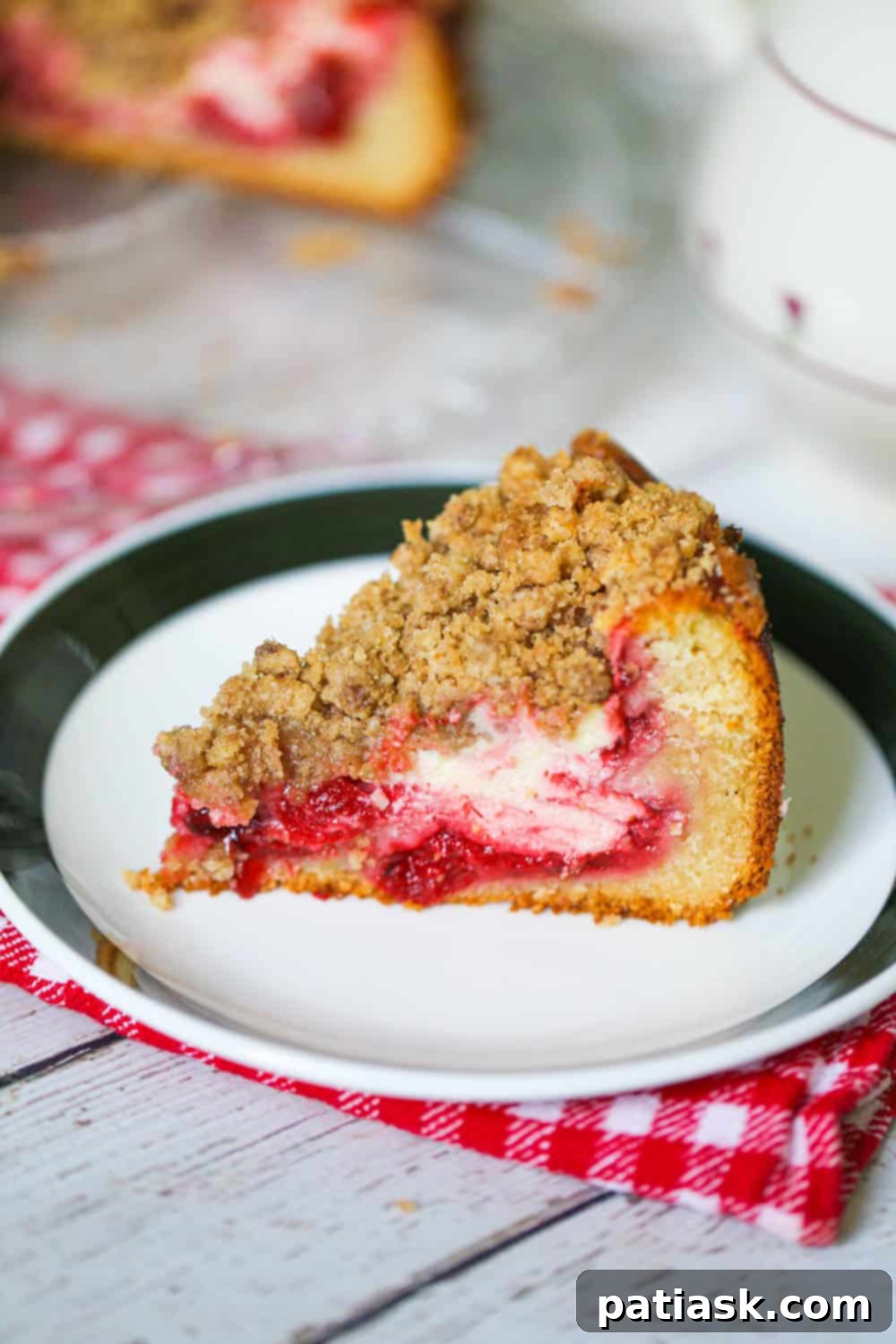 Cherry Cheesecake Coffee Cake 2 Delicious Cherry Cream Cheese Coffee Cake with a generous streusel topping, perfect for any occasion.
