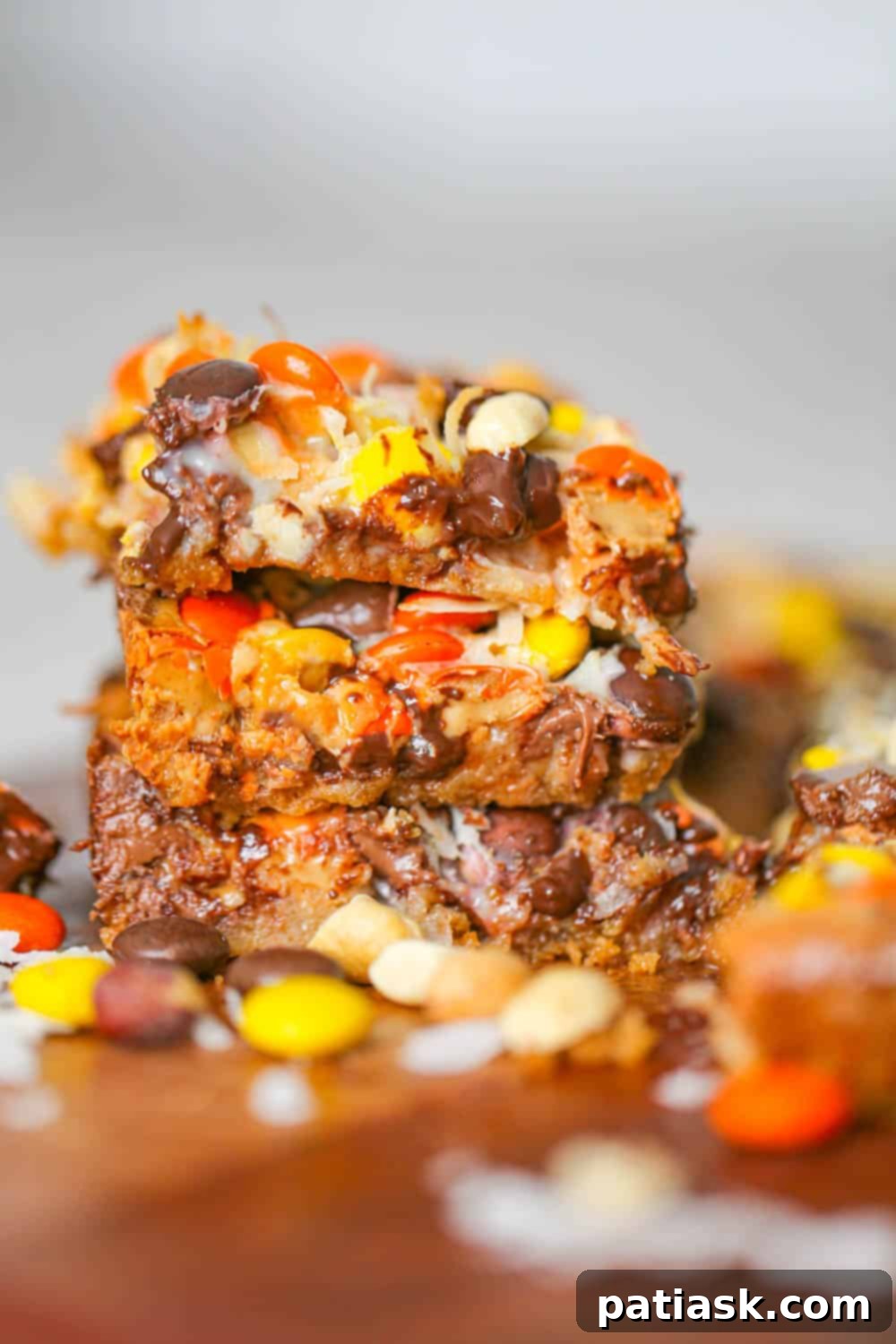 Reese's Pieces Peanut Butter Dream Bars 4 Delicious Reese's Pieces Magic Bars on a cooling rack