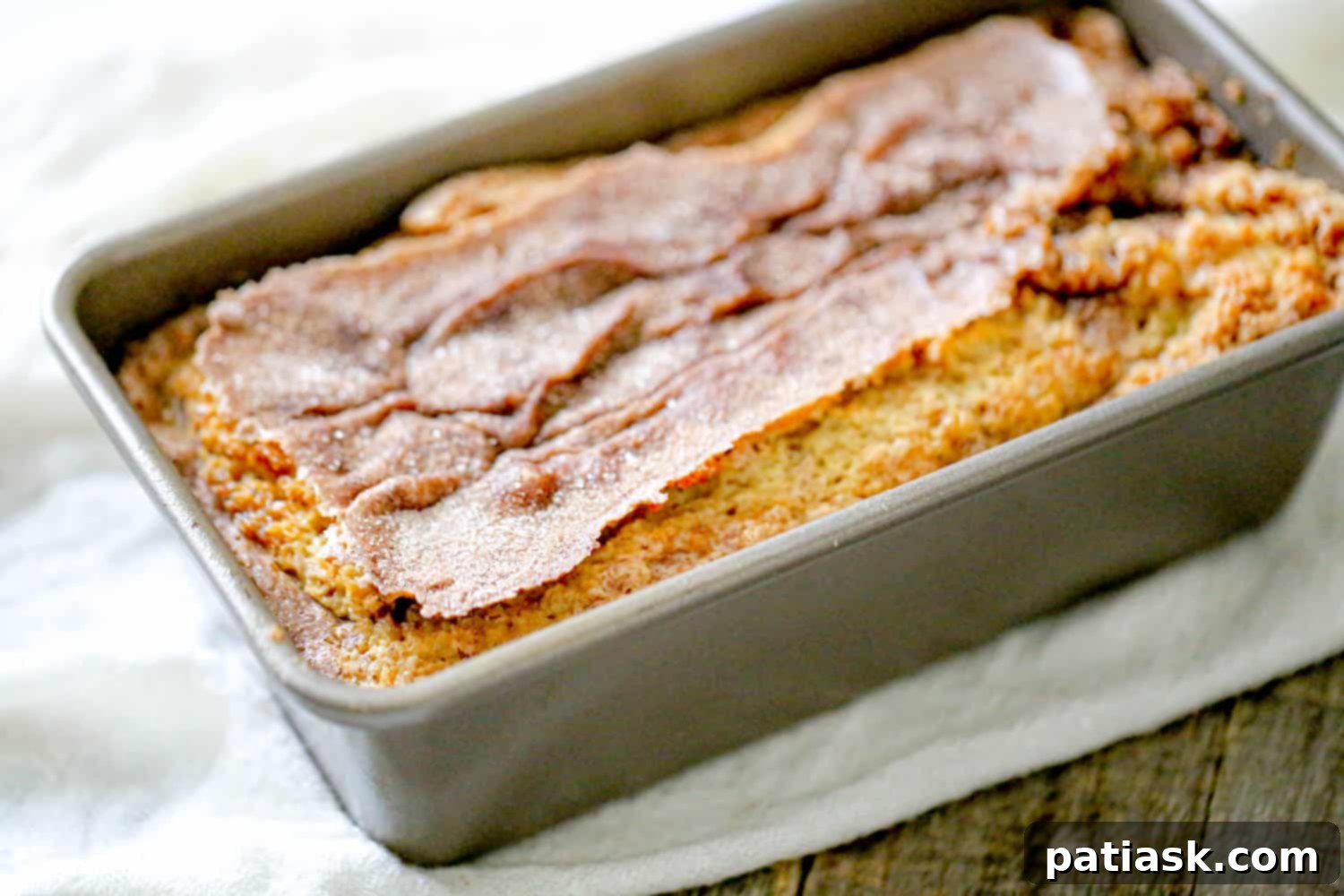 Amish Friendship Cinnamon Swirl Delight 6 A beautiful fall baking recipe showing the Amish Friendship Cinnamon Bread ready to be enjoyed with a cup of coffee.