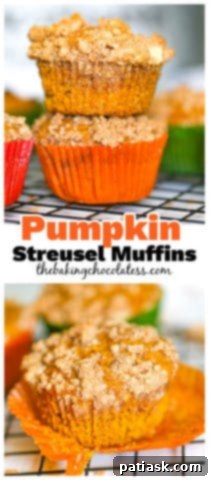 Spiced Pumpkin Crumble Muffins 10 Close-up of a single pumpkin streusel muffin, showcasing its delicate crumb topping and golden hue.