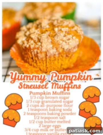 Spiced Pumpkin Crumble Muffins 12 A batch of pumpkin streusel muffins arranged aesthetically, ready for enjoyment.