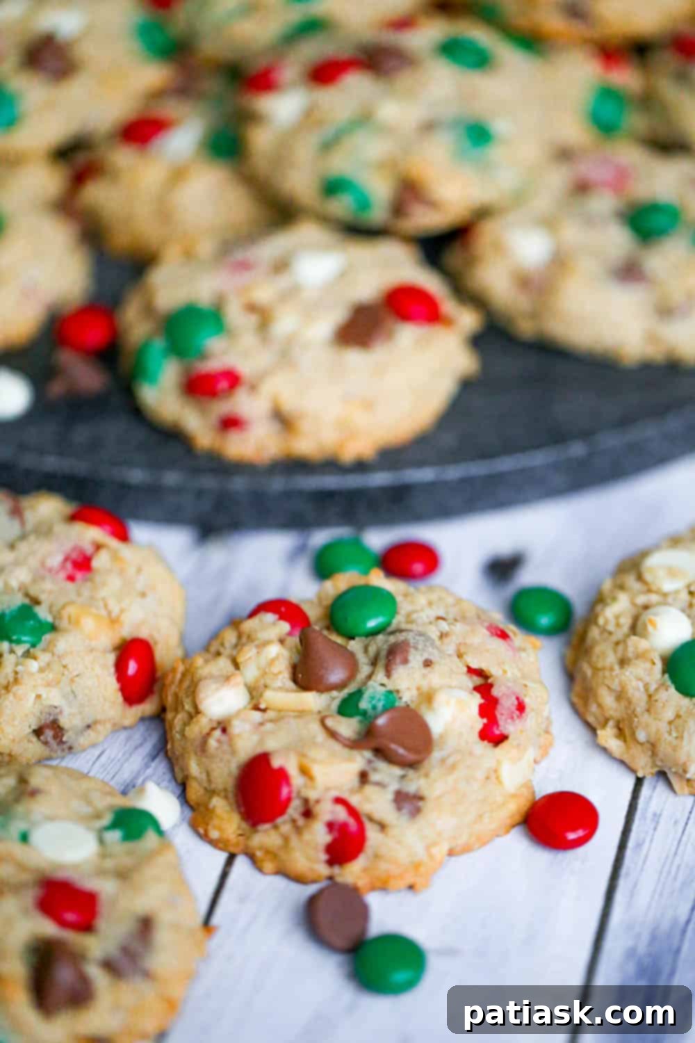 Thick Christmas cowboy cookies loaded with candies and chocolate chips