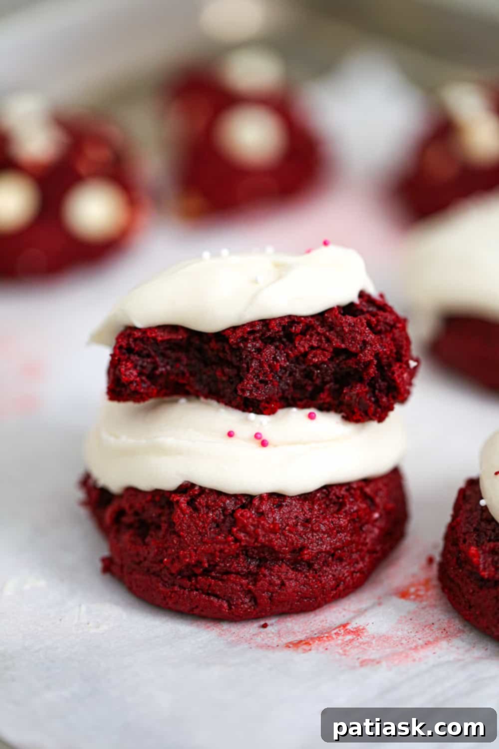 Red Velvet Levain Cookies with a generous dollop of cream cheese frosting
