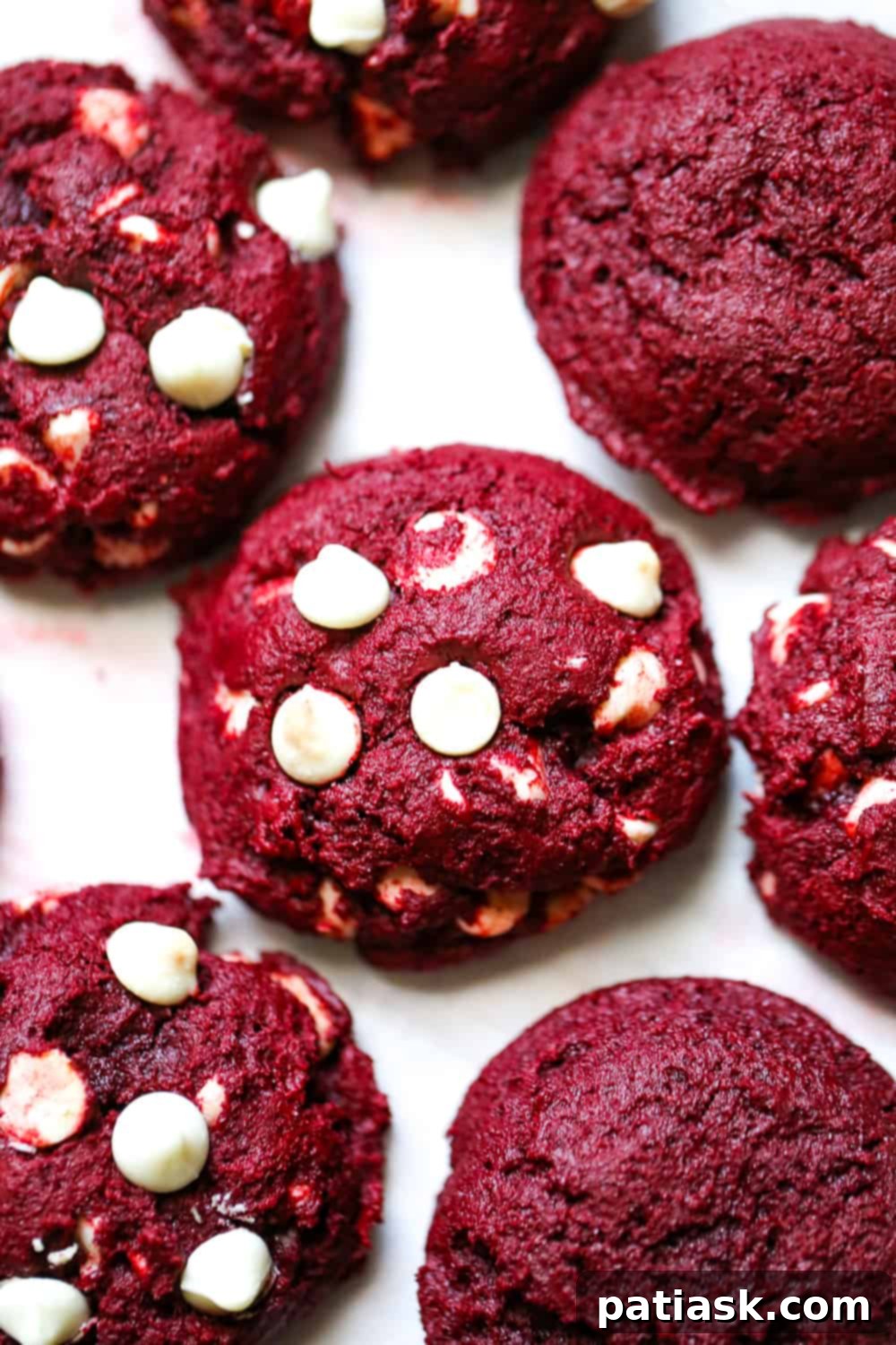 Red Velvet Levain Cookies with marshmallow frosting and white chocolate chips