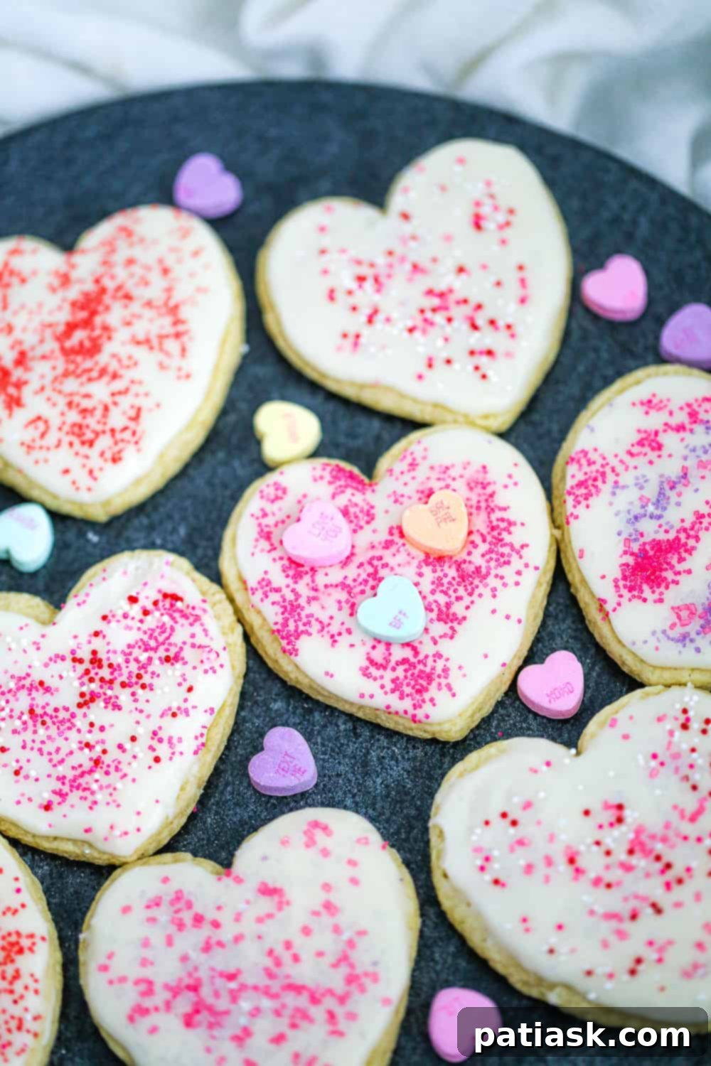 Love-Infused Vanilla Frosted Sugar Cookies 9 Decorated heart sugar cookies for Valentine's