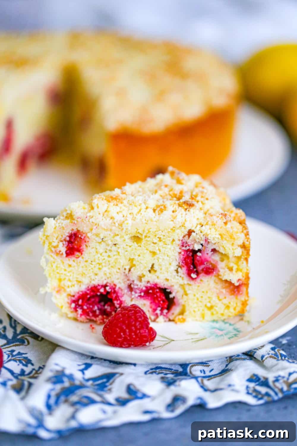 Close up of a slice of Lemon Raspberry Crumb Cake