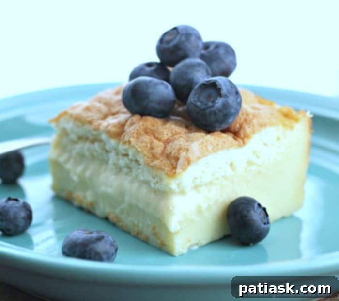 Vanilla's Layered Custard Dream 3 Close-up of a square slice of Very Vanilla Magic Custard Cake, showing its creamy and cakey layers