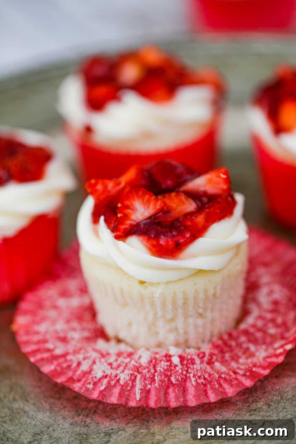 Strawberry Shortcake Cupcakes Made Simple 6 Ingredients laid out for making Strawberry Shortcake Cupcakes, including fresh strawberries and cake mix.