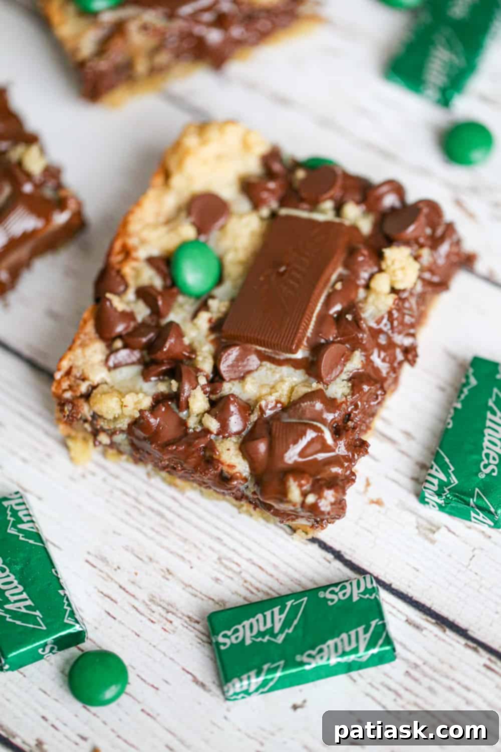 Mint Chocolate Chip Bars 4 Close-up of baked bars with sweetened condensed milk showing distinct layers
