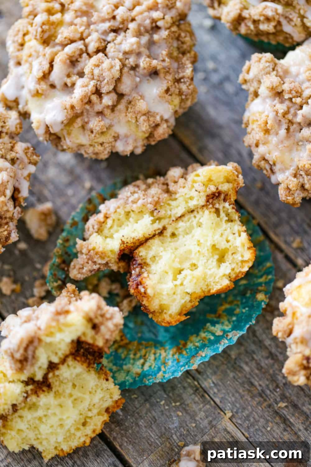 Cinnamon Streusel Muffins 3 made with Greek yogurt and cinnamon sugar layer in the middle. topped with the most delicious crumb topping, that best part!