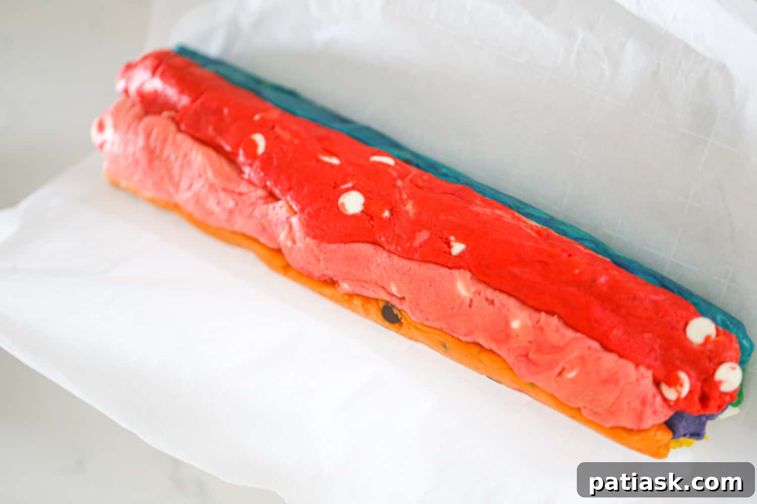 how to make Rainbow Chocolate Chip Cookies cutting