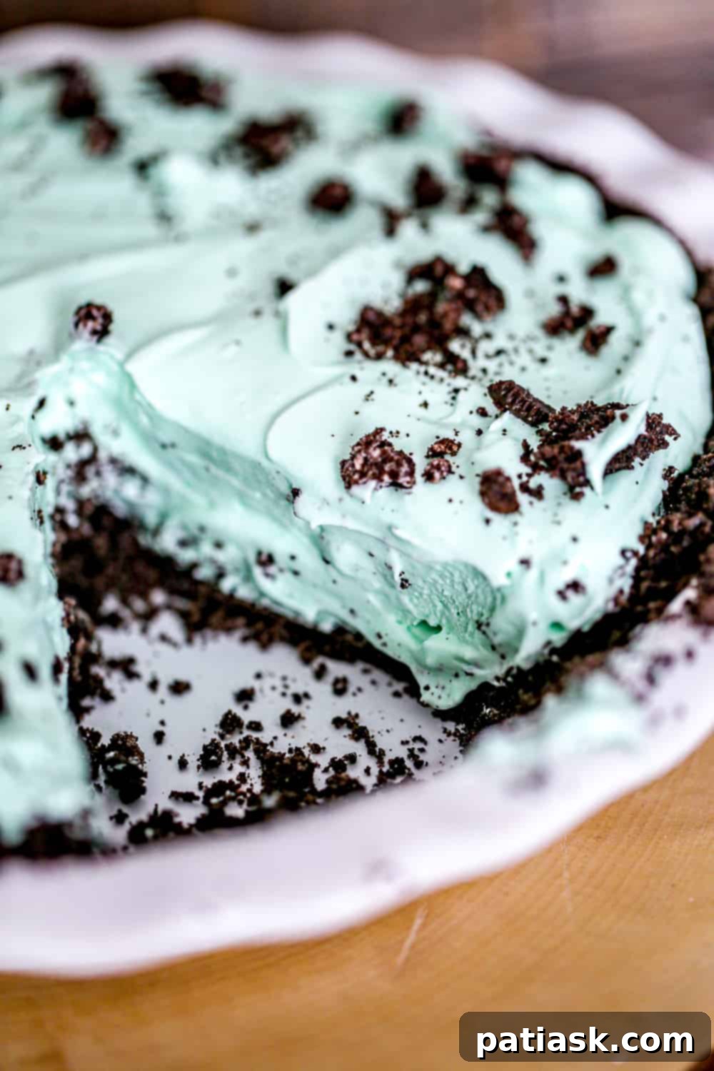 Bowl of creamy mint pie filling before chilling