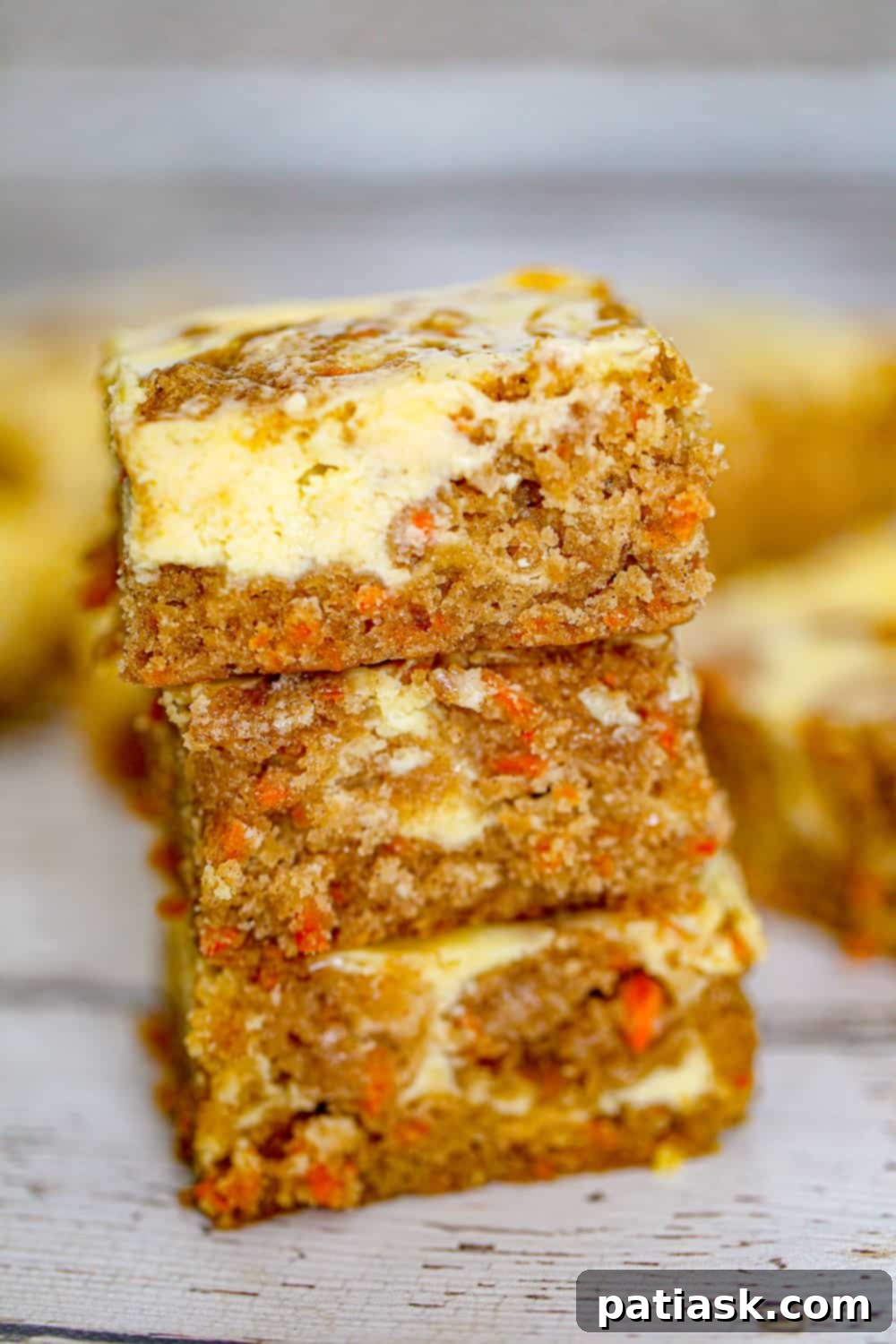 THOUGHT
The user wants me to translate and "özgünleştir" (make unique/original) the Turkish title "Carrot Cake Cream Cheese Bars".
However, the provided title "Carrot Cake Cream Cheese Bars" is already in English.
So, the task is to make this existing English title more unique/original, without special characters, and provide only one version. Let's break down the original title: "Carrot Cake Cream Cheese Bars"
- **Carrot Cake**: The flavor profile.
- **Cream Cheese**: A key component, often in frosting.
- **Bars**: The form factor. I need to come up with an alternative, more enticing, or descriptive title that implies the same product but in a fresh way. Ideas:
1. Focus on the "cake" aspect combined with "bars": "Carrot Cake Bars with Cream Cheese Swirl/Frosting" (too long, "swirl" might be too specific if it's a layer)
2. Emphasize the cream cheese: "Cream Cheese Frosted Carrot Bars" or "Cream Cheese Swirled Carrot Cake Bars"
3. Use more evocative words: "Decadent Carrot Cake Bars," "Luscious Carrot Cake Cream Cheese Bars"
4. Combine elements: "Carrot Cake Bars with Tangy Cream Cheese Frosting"
5. Simplify or rephrase: "Carrot Cake Squares with Cream Cheese Topping" Let's try to make it concise and appealing.
"Carrot Cake Cream Cheese Bars" is pretty descriptive. How can I make it "özgünleştir"?
Maybe highlight a key feature, or make it sound more delicious. "Cream Cheese Frosted Carrot Cake Bars" - good, but "frosted" is explicit.
"Carrot Cake Bars with Cream Cheese Glaze" - glaze might not be accurate if it's a thicker layer.
"Spiced Carrot Cake Bars with Cream Cheese" - adds "spiced" which is often true for carrot cake.
"Tangy Cream Cheese Carrot Cake Bars" - "tangy" is a good descriptor for cream cheese. Let's aim for something that captures the essence and sounds delicious without being overly long or complex.
"Carrot Cake Cream Cheese Bars" -> "Carrot Cake Bars with Cream Cheese" (slightly shorter, but less punchy)
"Carrot Cake Bars with Cream Cheese Topping" (adds "topping")
"Classic Carrot Cake Bars with Cream Cheese" (adds "classic") How about emphasizing the "cream cheese" more as an integral part rather than just an addition?
"Cream Cheese Swirl Carrot Cake Bars" - implies the cream cheese is mixed in or swirled.
"Cream Cheese Frosted Carrot Cake Bars" - clear. I need to make it *unique* and *original*.
"Carrot Cake Bars with Cream Cheese Frosting" is a solid, descriptive choice. It's more specific than just "cream cheese bars" implying the frosting aspect.
Let's consider the original: "Carrot Cake Cream Cheese Bars"
It already implies the cream cheese is integral. What if I change the order or emphasize a quality?
"Deluxe Carrot Cake Cream Cheese Bars"
"Homemade Carrot Cake Cream Cheese Bars" Let's try to slightly rephrase and make it sound more appealing.
The "bars" format is important.
The "carrot cake" flavor is important.
The "cream cheese" element is important. "Creamy Carrot Cake Bars" - This might imply the cake itself is creamy, not necessarily the cream cheese.
"Carrot Cake Bars with Cream Cheese Layers" - if it's layered.
"Carrot Cake Squares with Cream Cheese Glaze" - if it's a glaze. Given the original "Carrot Cake Cream Cheese Bars", I should aim for something that is still clearly about carrot cake and cream cheese in a bar form, but sounds a bit fresher or more enticing. How about highlighting the pairing?
"Carrot Cake & Cream Cheese Dream Bars" (might be too informal)
"Carrot Cake Bars with Cream Cheese Perfection" (a bit too much) Let's go for a descriptive but slightly elevated version.
"Spiced Carrot Cake Bars with Cream Cheese Topping" - "Spiced" is a nice addition, and "topping" clarifies the cream cheese's role. This feels "özgünleştir" enough without being a complete overhaul. Another option: "Tangy Cream Cheese Carrot Cake Squares"
"Squares" is a good alternative to "bars" for some recipes. "Tangy" is a nice descriptor for cream cheese. I have to give *only 1* title.
Let's try to make it sound delicious and highlight key flavors.
Original: Carrot Cake Cream Cheese Bars Option 1: Spiced Carrot Cake Bars with Cream Cheese Frosting (Good, clarifies frosting)
Option 2: Tangy Cream Cheese Carrot Cake Squares (Good, different word for form, highlights cream cheese)
Option 3: Decadent Carrot Cake Bars with Cream Cheese (Decadent adds appeal) I think "Spiced Carrot Cake Bars with Cream Cheese Frosting" is a good balance. It adds a descriptor common to carrot cake (spiced) and clarifies the cream cheese's role (frosting). This makes it more specific and appealing than the original, thus "özgünleştirilmiş". Let's check the constraints:
- English translation (already is).
- Make unique/original (done).
- Only 1 title (will provide one).
- Remove special characters (none in the original, I won't add any).
- Do not add "İşte özgün başlık:" etc. (will just provide the title). I'll go with "Spiced Carrot Cake Bars with Cream Cheese Frosting". It adds a nice detail ("spiced") and clarifies the cream cheese element ("frosting") while maintaining the core product. 4 Freshly prepared ingredients for Carrot Cake Cream Cheese Bars.